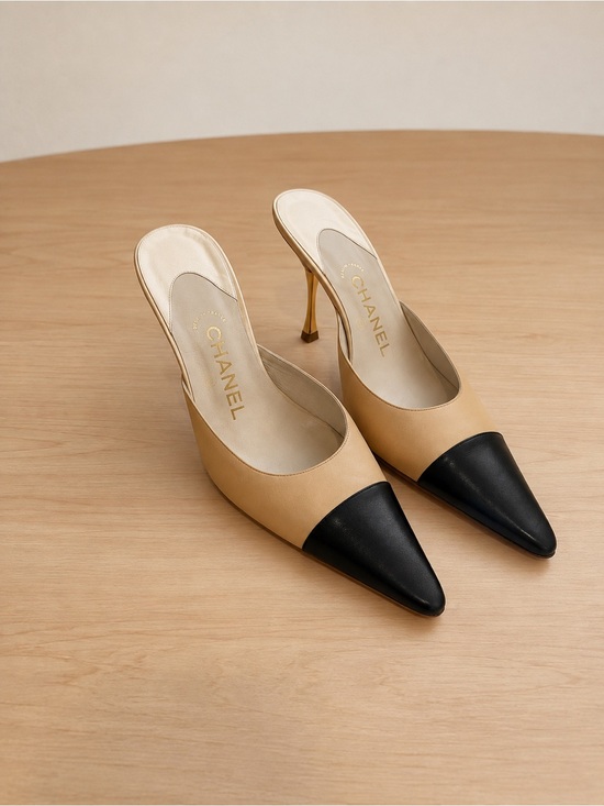CHANEL Shoes - Vintage CHANEL Beige with Black Pointed Toe Mule Heels size 38.5
